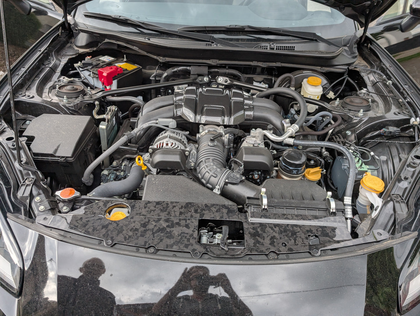 GreenFuchs | Full carbon engine compartment cover lock carrier | GR86 & BRZ II